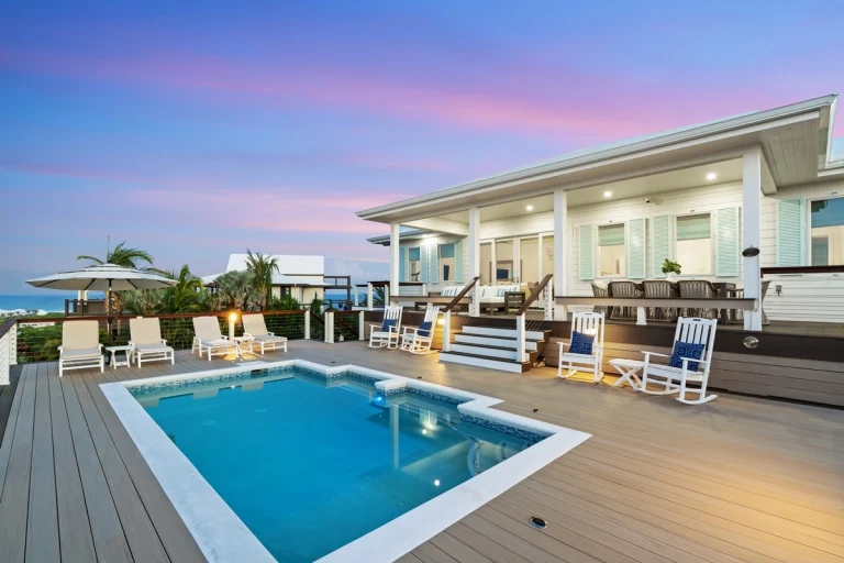 Pool deck in front of the house at dusk at Incommunicado, Hope Town, Elbow Cay