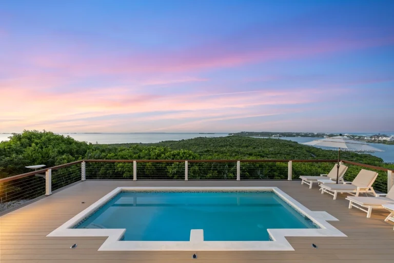 Pool at sunset with view over the trees at Incommunicado, Hope Town, Elbow Cay