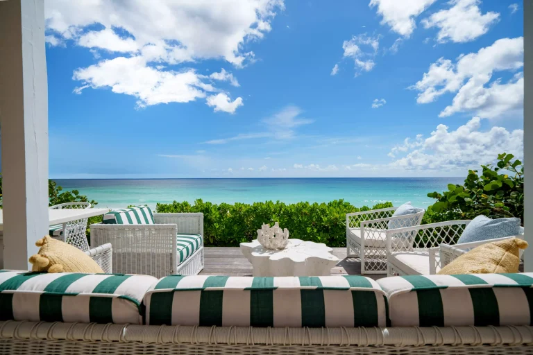 Striped daybed with ocean view at Sea Siren, Dunmore Town, Harbour Island