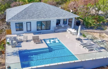 Aerial view of the house and pool at Beyond Blue Exuma, Moss Town, Great Exuma